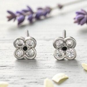 Sterling Silver Floral CZ Stud Earrings in Silver